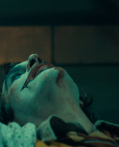 The Joker Has A Bloody Poster & A Maniacal Trailer